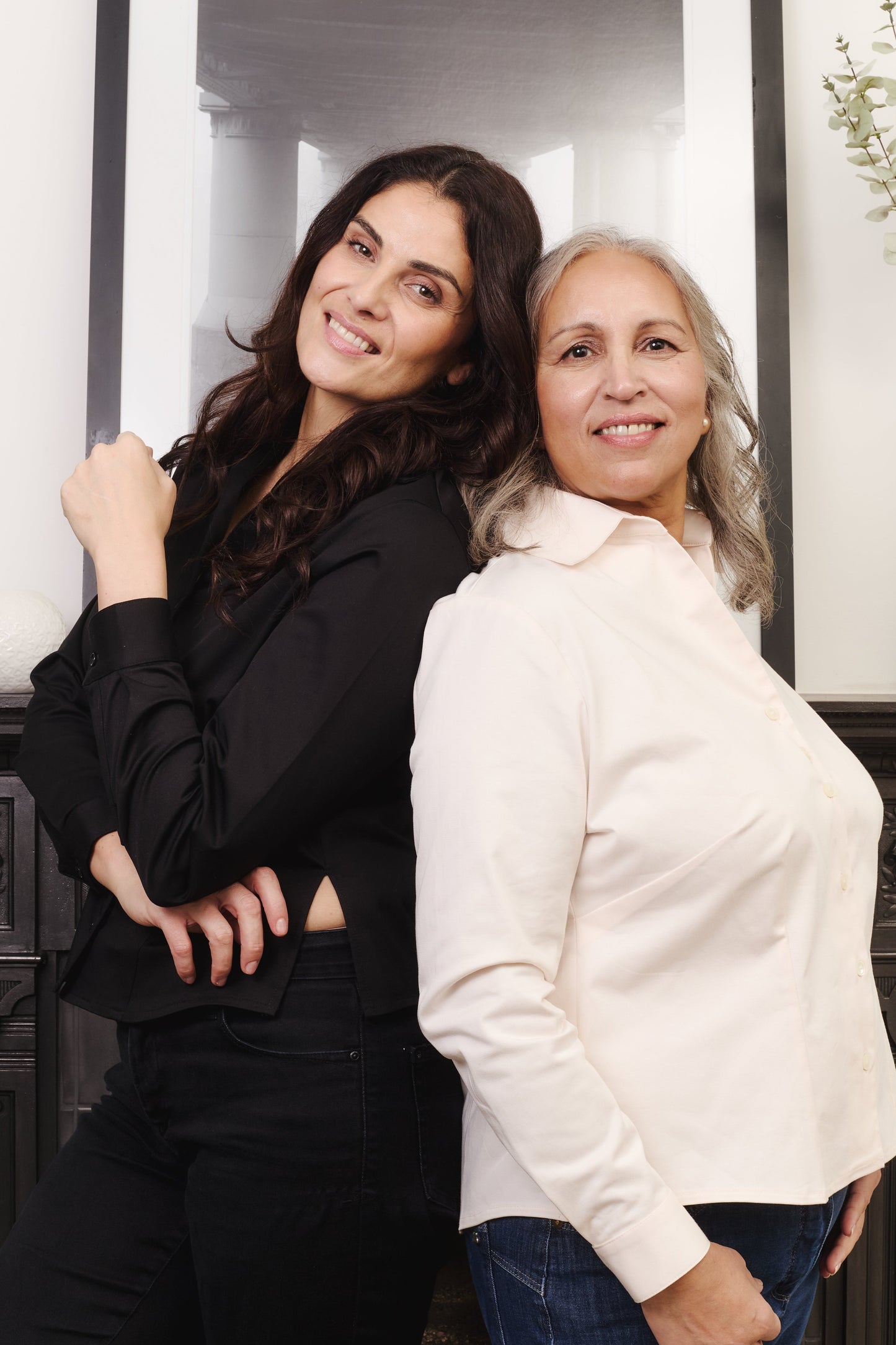 Two models showing the Nova shirt to give the customer a better idea of how the fit works for different body shapes. Both models are fuller bust size. Shirts by Kin+Star.